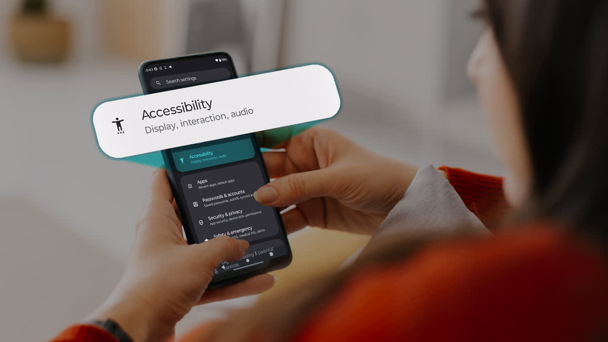 Person navigating smartphone accessibility settings for display and interaction customization