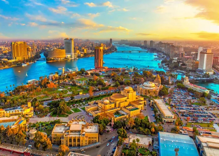 Egypt tour packages with flights during Cairo sunset offer stunning views