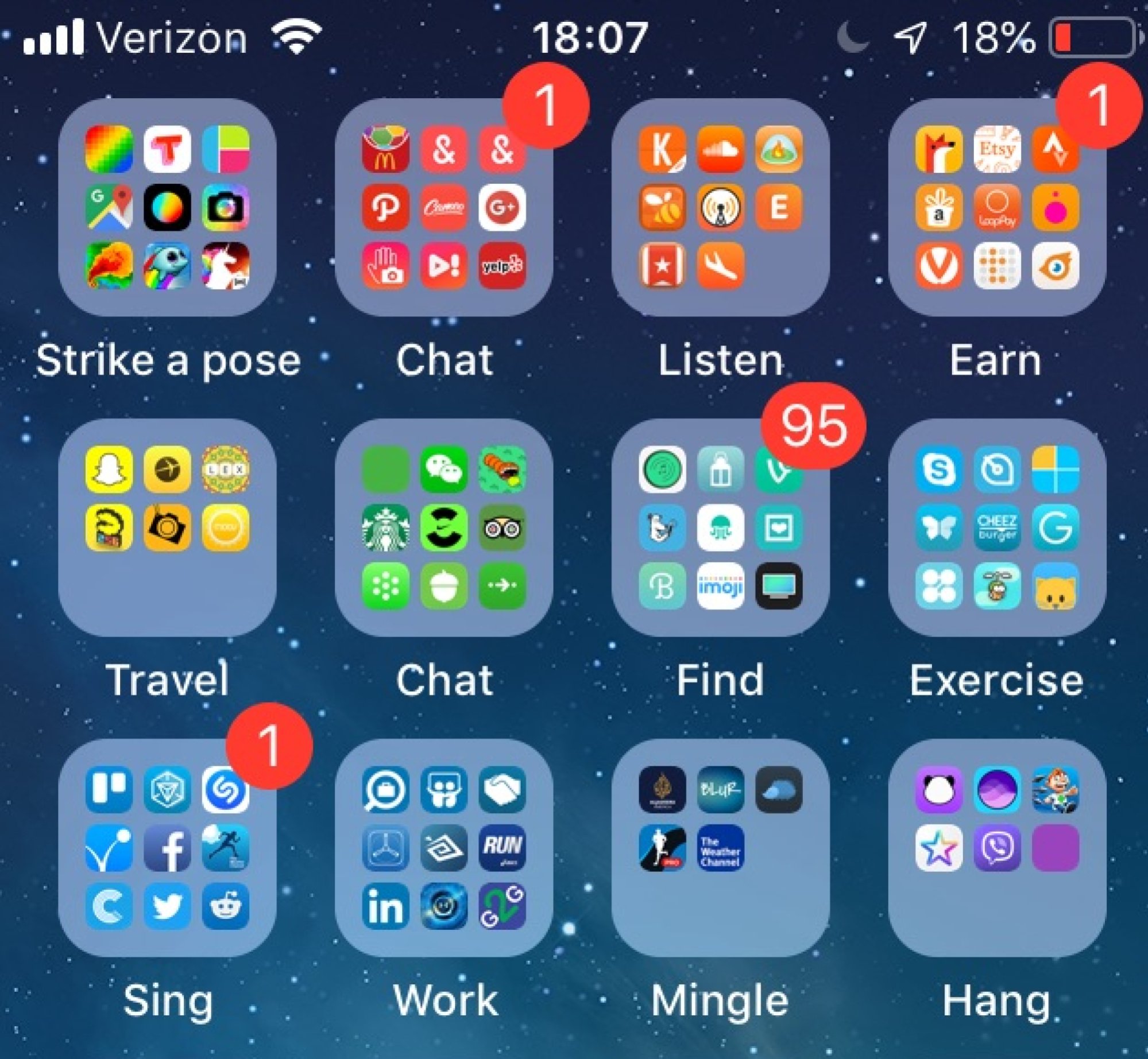 iPhone home screen organized with verb-based app folders