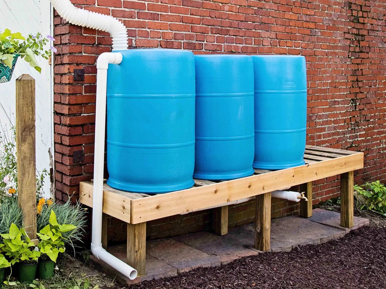 How to Install a Rain Barrel | DIY Rain Barrel Stand | HGTV