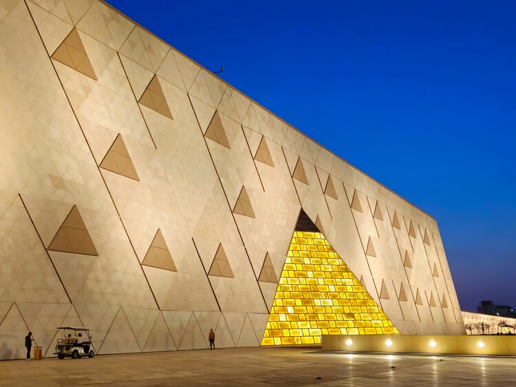 Grand Egyptian Museum at night illuminated