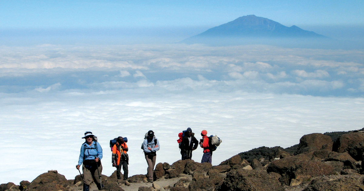 Mount Kilimanjaro trekkers above the clouds Tanzania