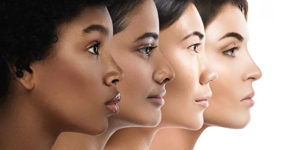 Diverse skin tones represented in professional dermatology consultation