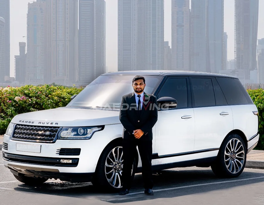luxury SUV rental Dubai – Range Rover driving through Dubai